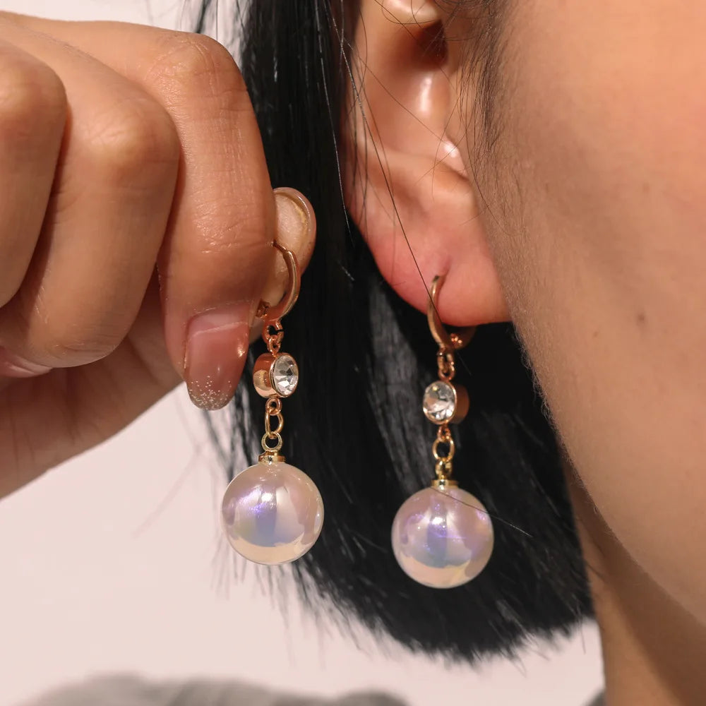 Simulation Pearl Long Earrings:
- Style: 2022 New Trend
- Design: Flower Rhinestone
- Type: Wedding Pendant Earrings