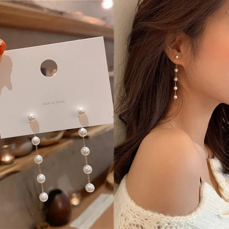 Simulation Pearl Long Earrings:
- Style: 2022 New Trend
- Design: Flower Rhinestone
- Type: Wedding Pendant Earrings