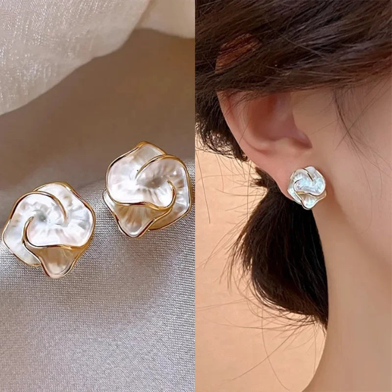 White Enamel Flower Stud Earrings:
- Style: Folded Unique Design
- Material: Multi-layers Floral
- For: Women
- Year:2024 New