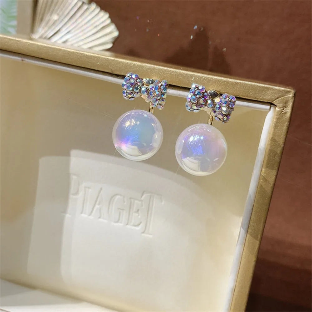 Simulation Pearl Long Earrings:
- Style: 2022 New Trend
- Design: Flower Rhinestone
- Type: Wedding Pendant Earrings