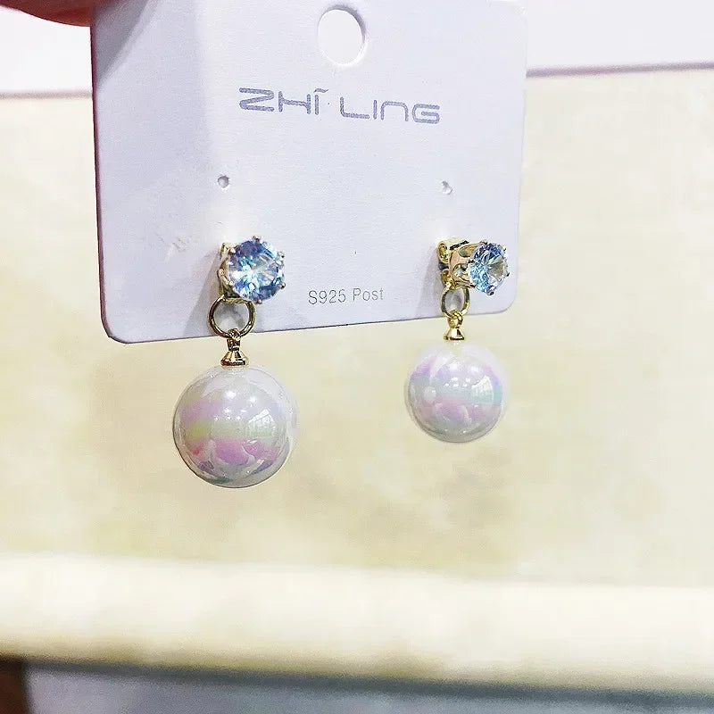 Simulation Pearl Long Earrings:
- Style: 2022 New Trend
- Design: Flower Rhinestone
- Type: Wedding Pendant Earrings