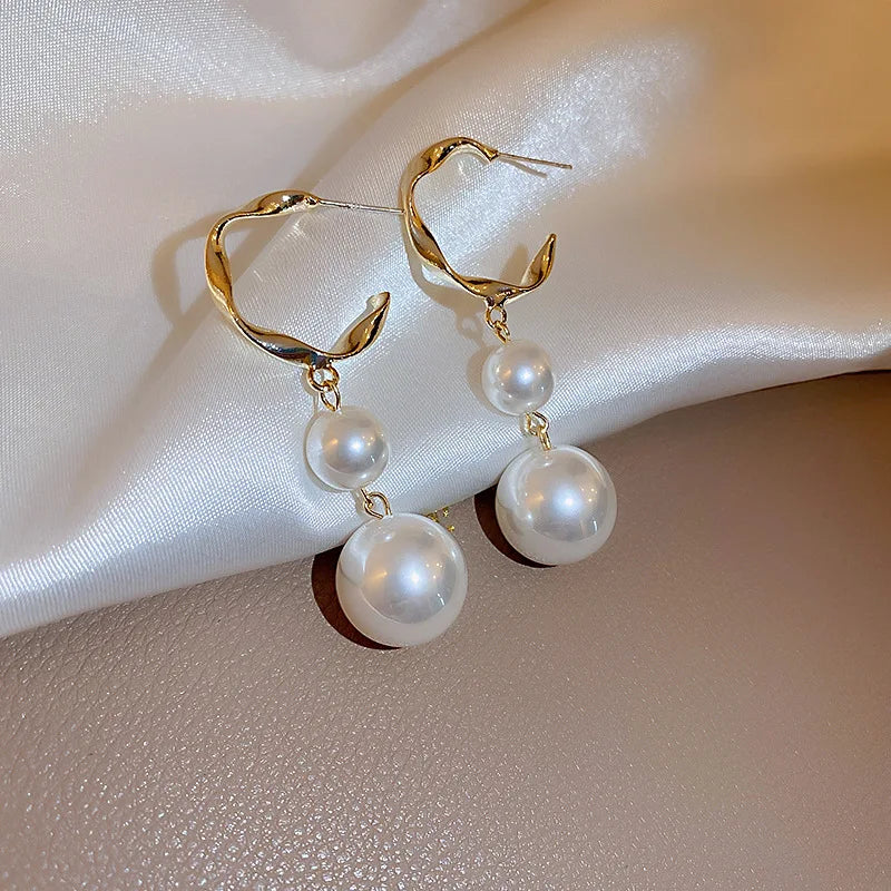 Simulation Pearl Long Earrings:
- Style: 2022 New Trend
- Design: Flower Rhinestone
- Type: Wedding Pendant Earrings