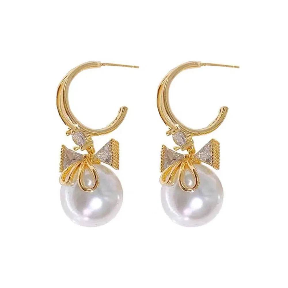 Simulation Pearl Long Earrings:
- Style: 2022 New Trend
- Design: Flower Rhinestone
- Type: Wedding Pendant Earrings